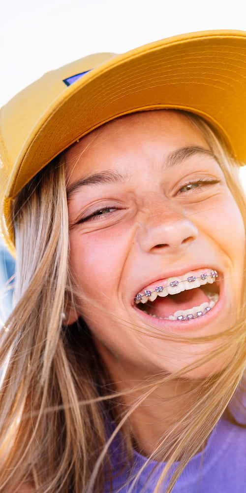 A girl is happily smiling